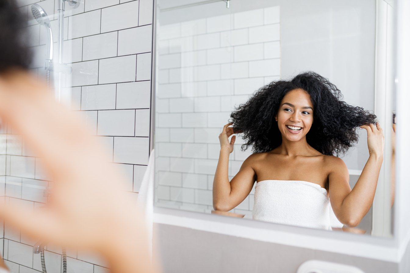 Woman Looking at Mirror